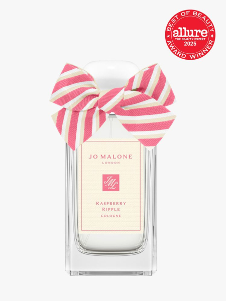 Jo Malone Raspberry Ripple in clear glass bottle with decorative ribbon cap on light gray background with red Allure Best of Beauty seal in the top right corner